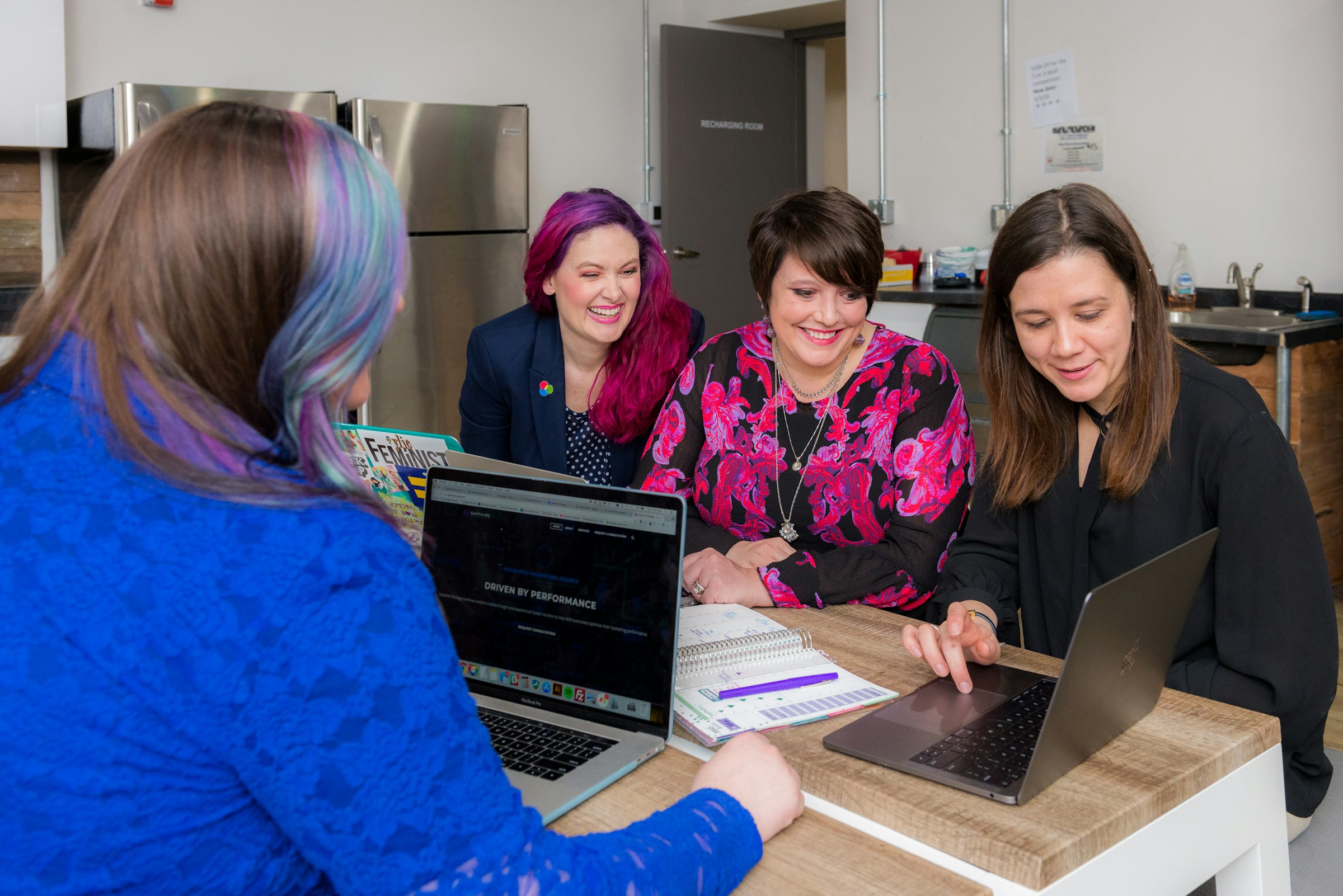 employees in an office - LinkedIn Content Ideas 