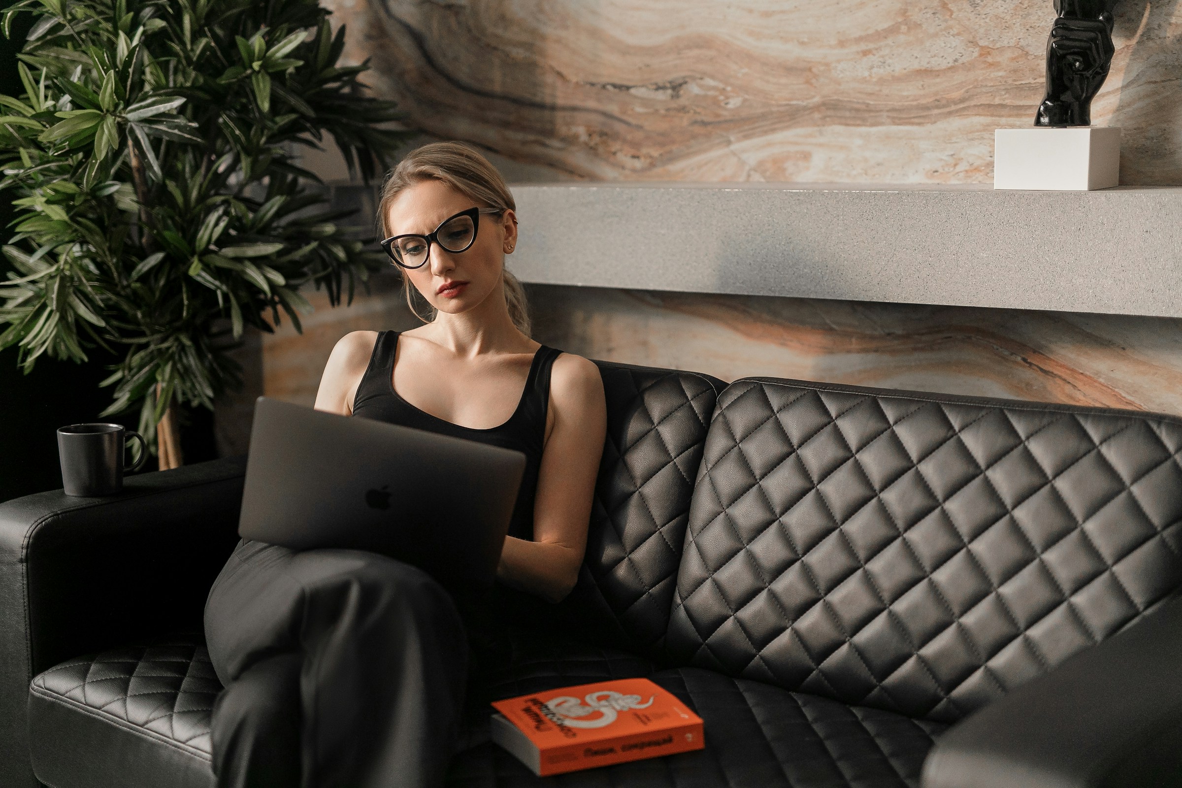 woman on a laptop - B2B Content Marketing LinkedIn
