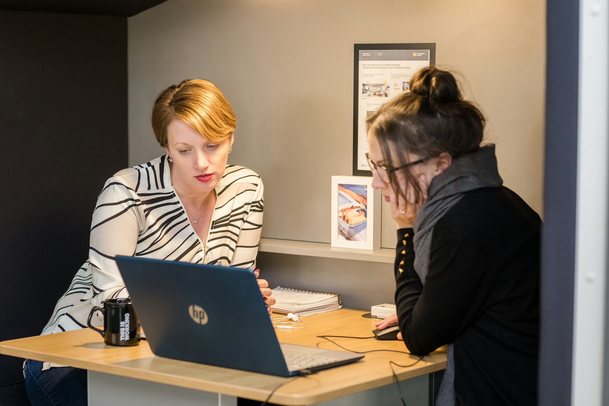 women using a laptop - Authoredup vs Taplio