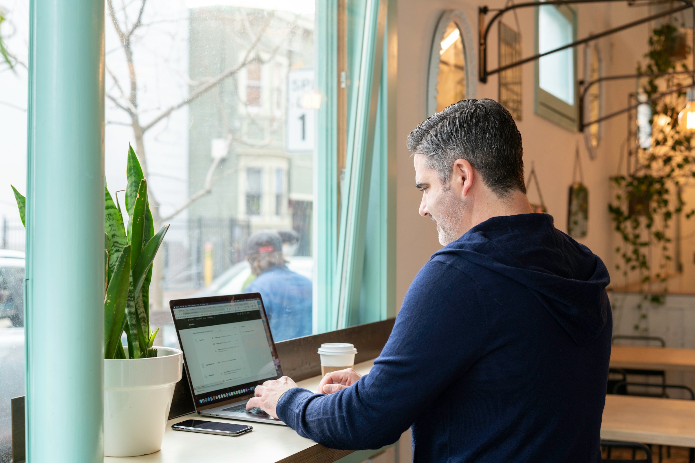 man on a laptop - LinkedIn Tools