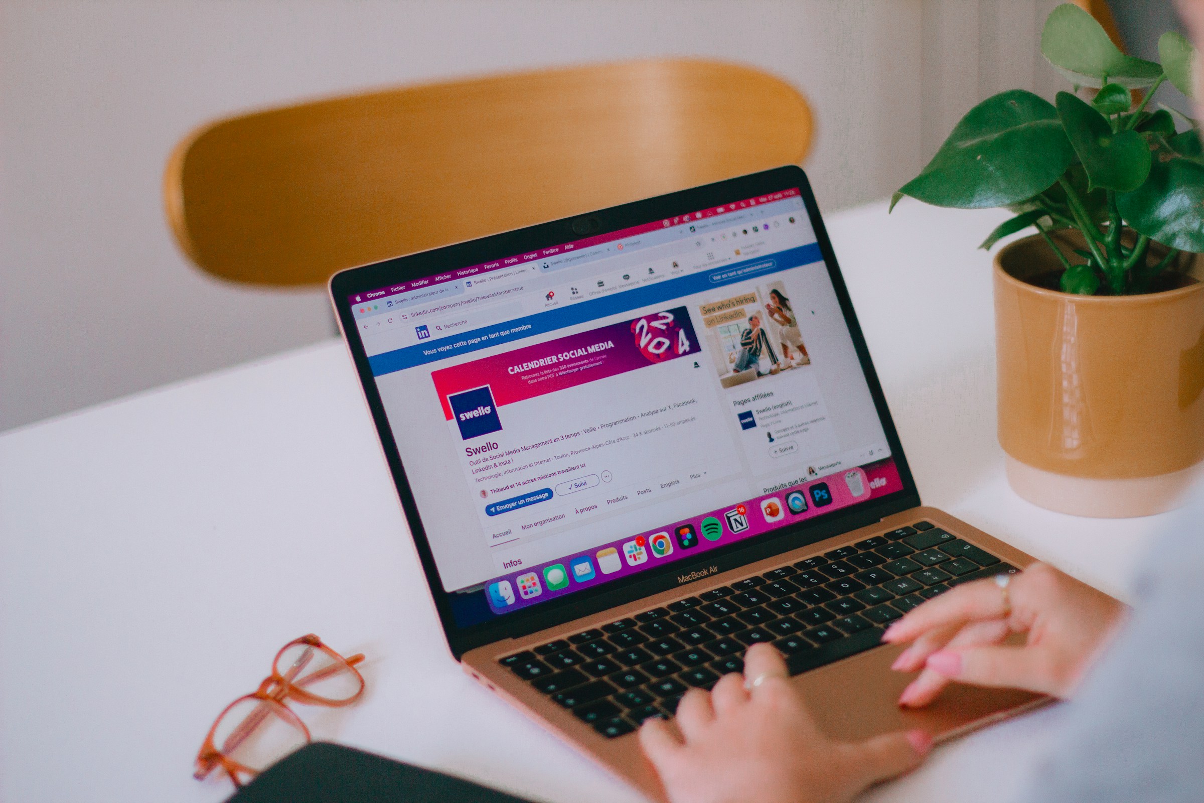 woman typing on a laptop - LinkedIn Post Examples
