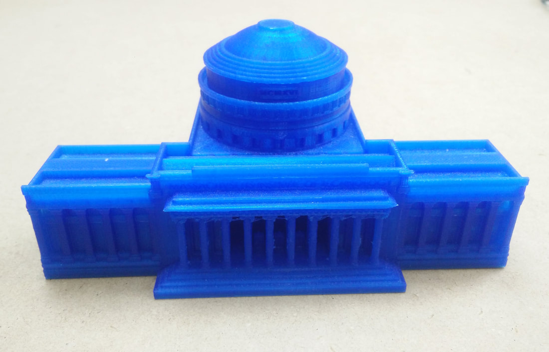 Blue plastic toy building set with dome turret and rectangular base pieces