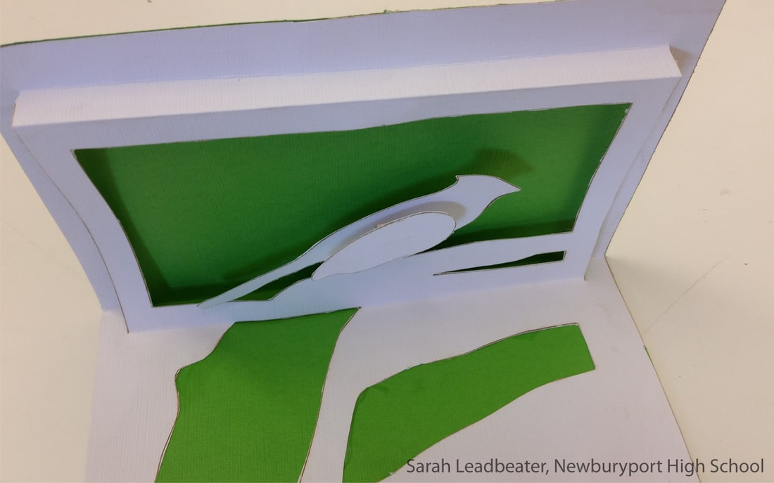 Paper art sculpture with white bird and green geometric shapes, credited to Sarah Leadbeater