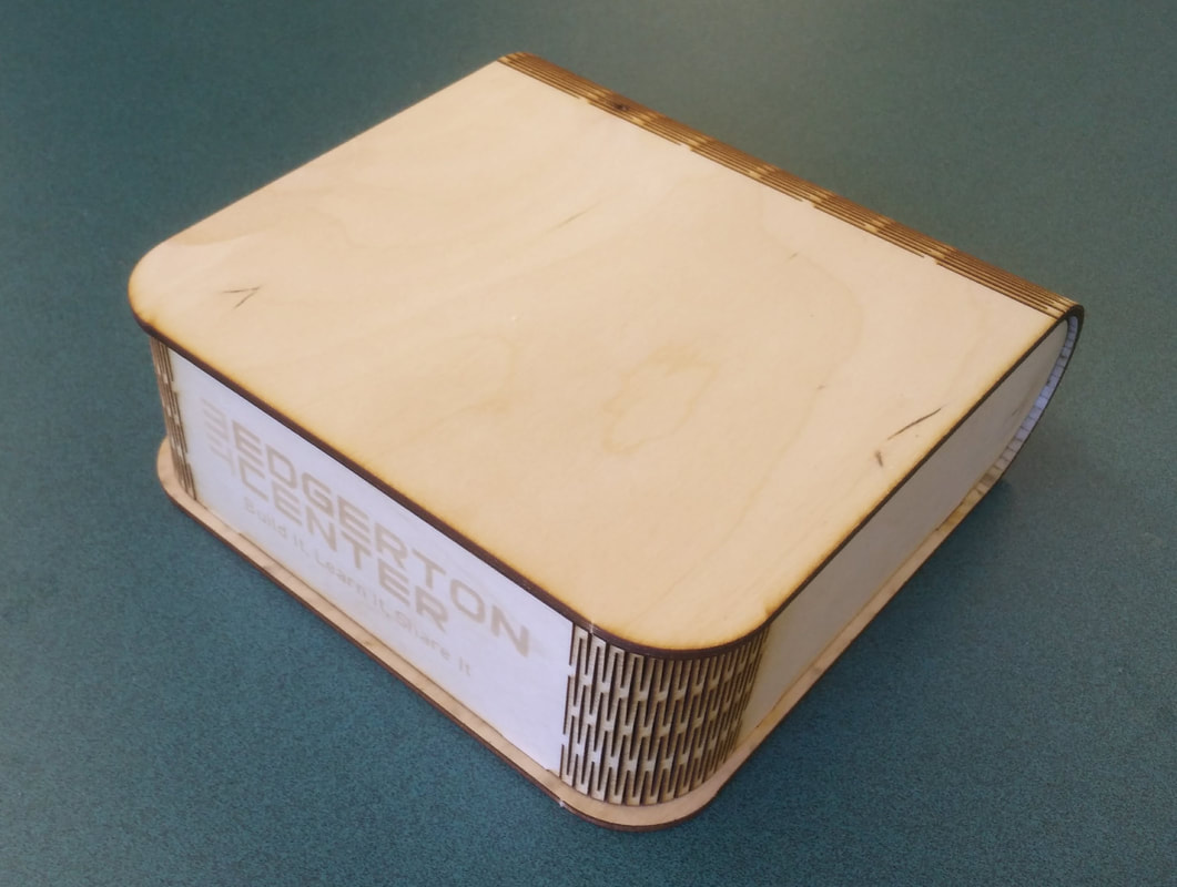 Beige wireless router with ventilation grille on turquoise surface background