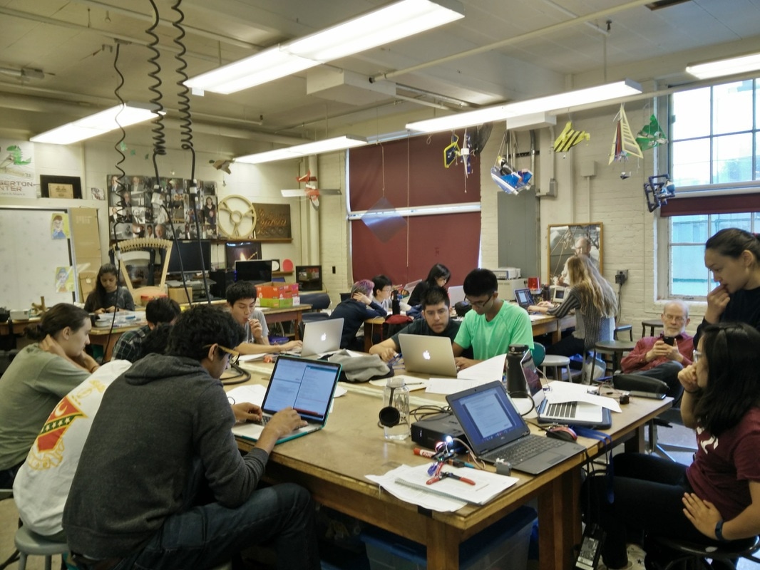 Wrap around seating at larger tables lets collaborators shift to individual work as needed.