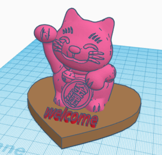 a screenshot of a 3D model in Tinkercad made of a heart-shaped base, the text "welcome" and a lucky cat figure.