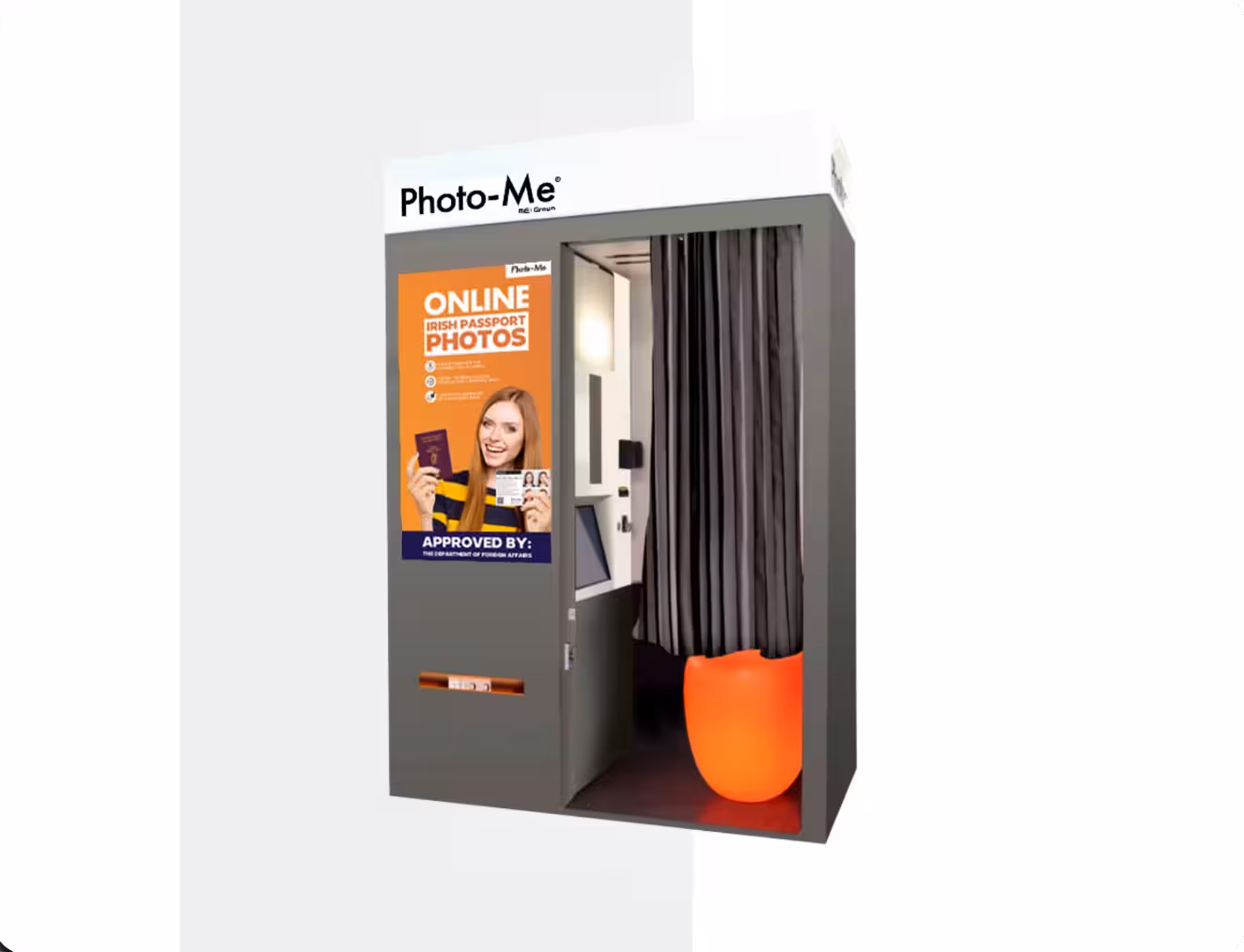 Photo-Me passport photo booth with a poster advertising online Irish passport photos approved by the Department of Foreign Affairs.