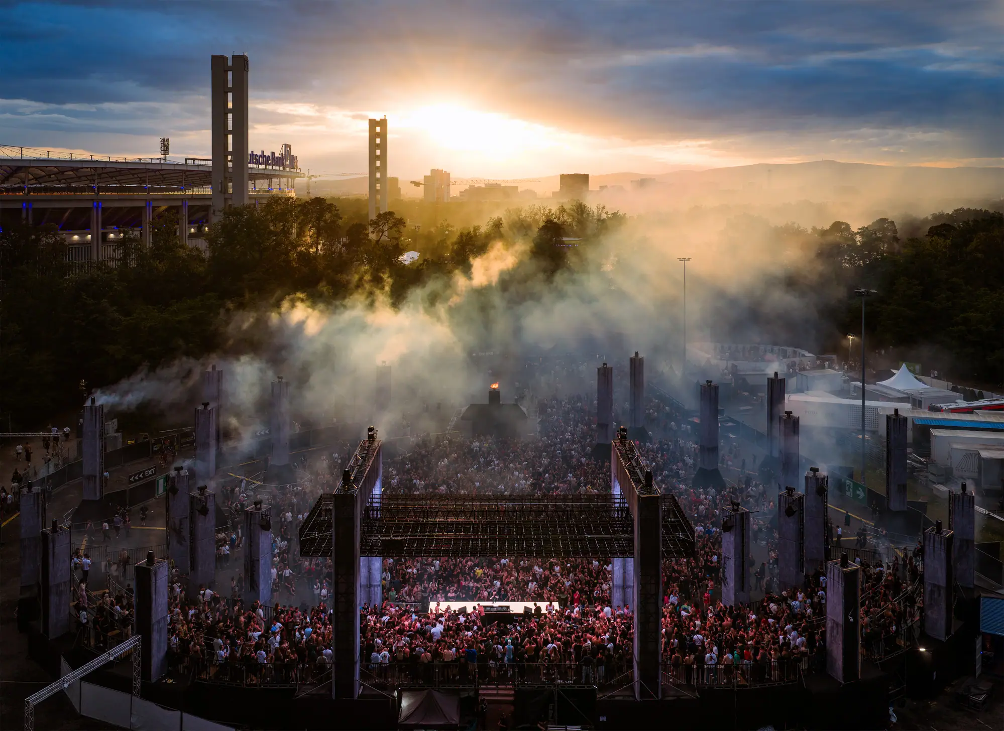 Large festival at sunset.