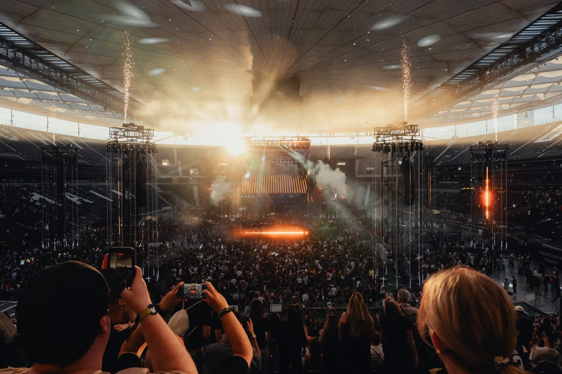 Large concert arena crowd.