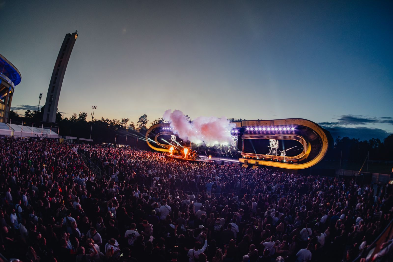 Large concert arena crowd.