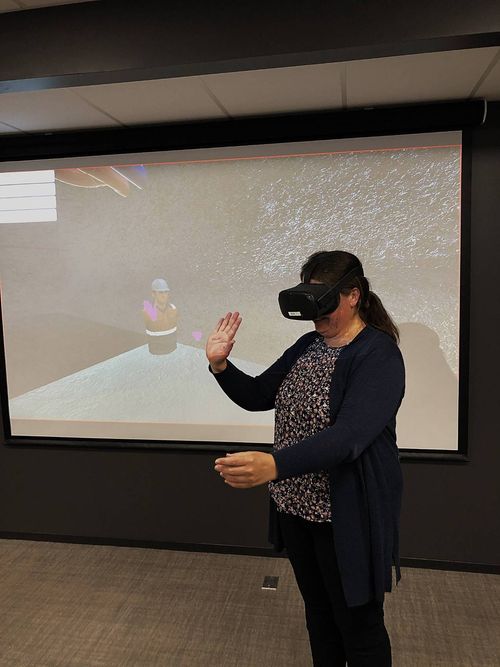 A woman using a VR headset