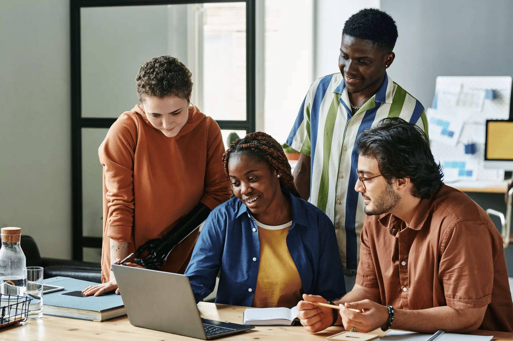 Employees celebrating a workplace achievement