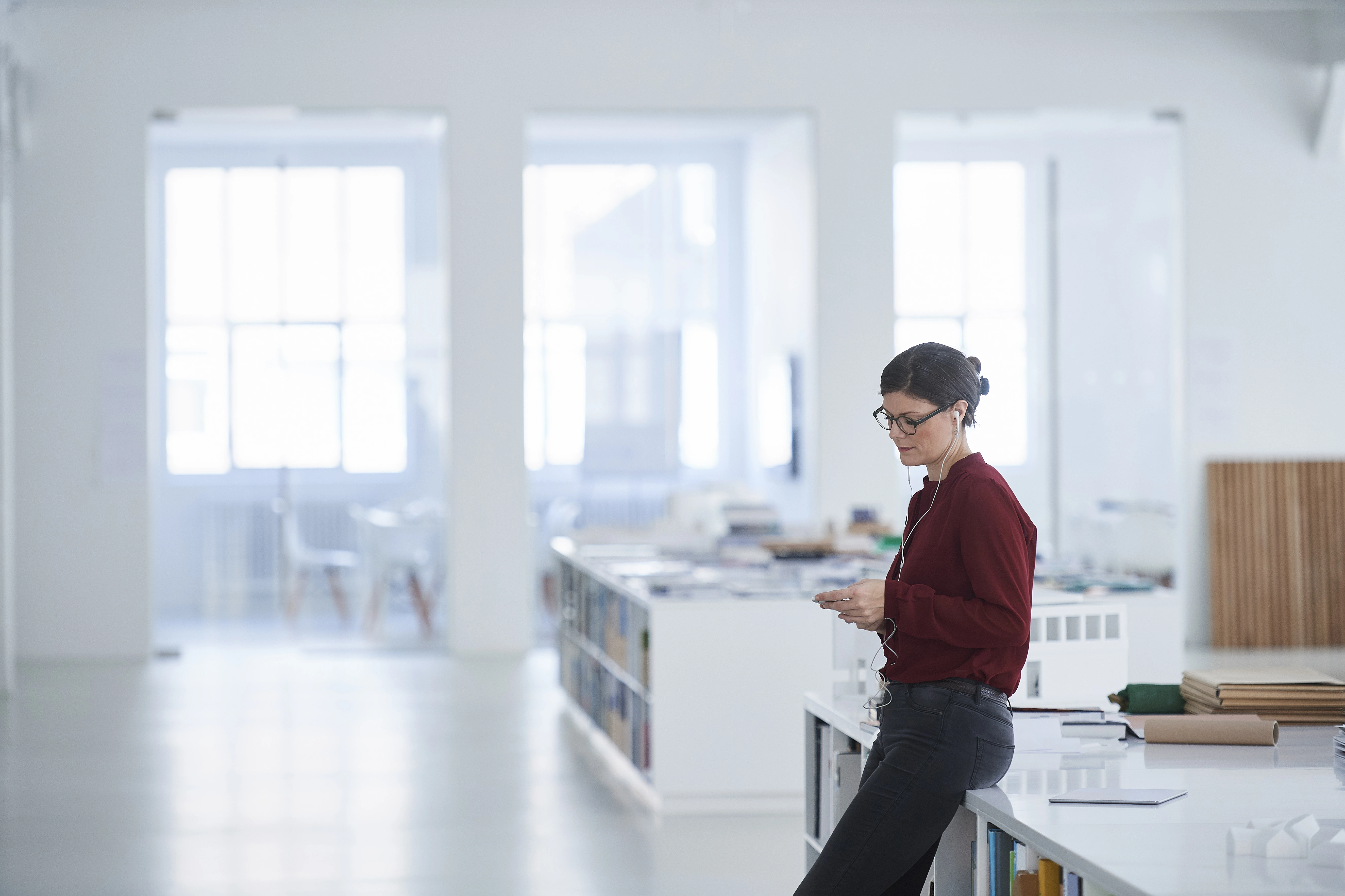 A woman in a single physical office space