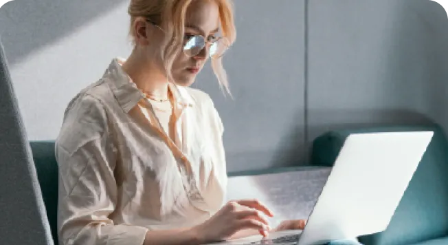 Professional working on Company Formation in Dubai using laptop