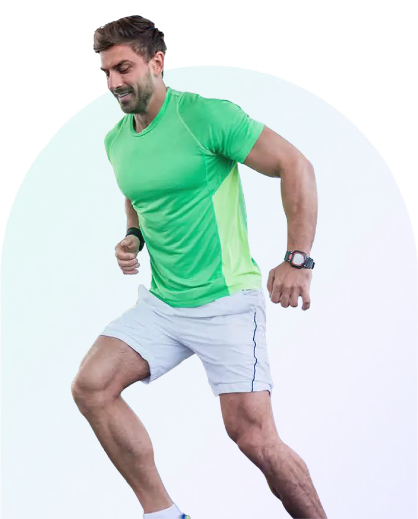 Establish Company In Dubai: Athletic Man Running in Green Workout Gear
