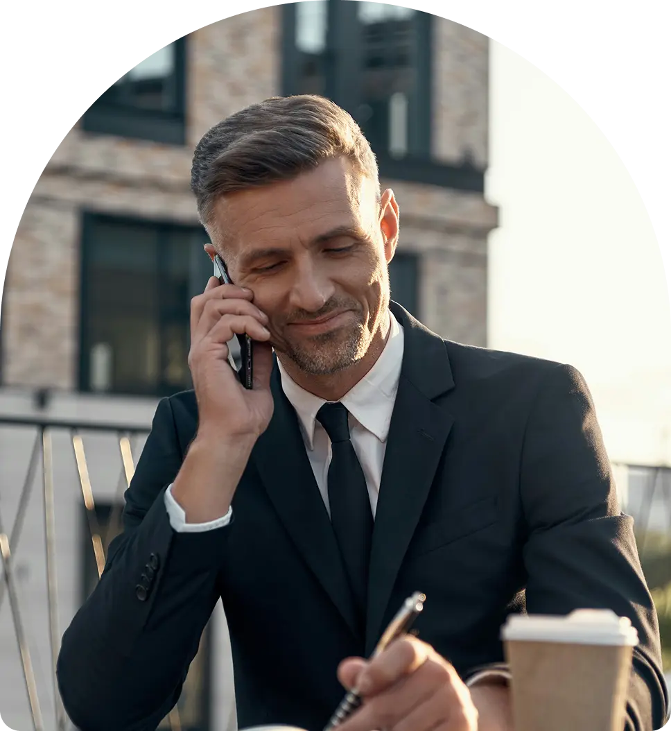 Business professional discussing Company Formation in Dubai via phone