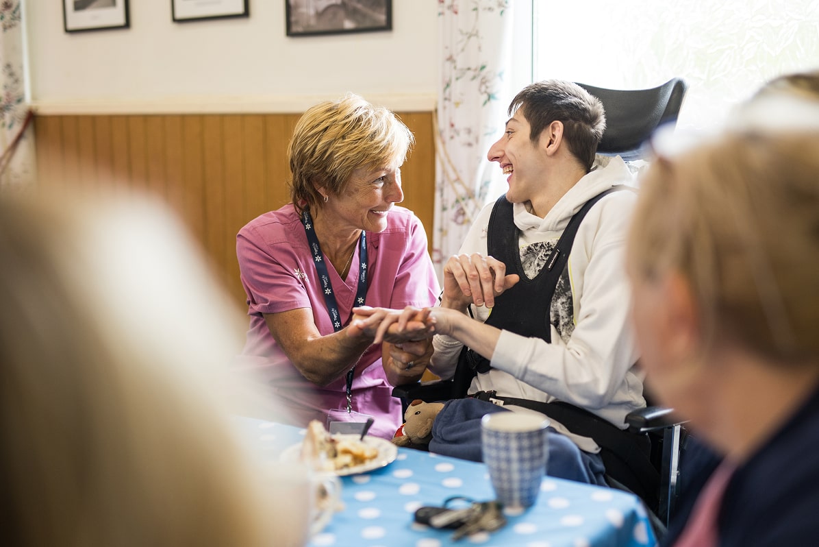 Tiger Lily Care founder with patient