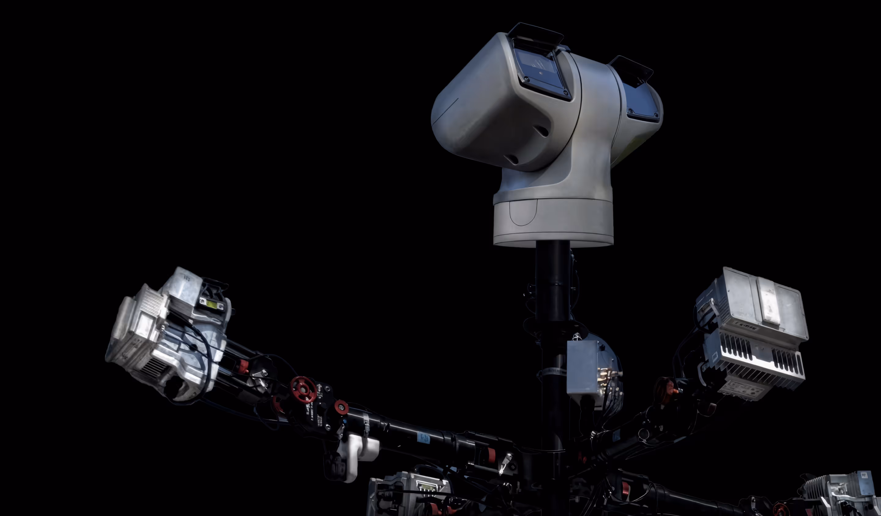 Surveillance device with dual cameras and sensors mounted on a black stand against a black background.