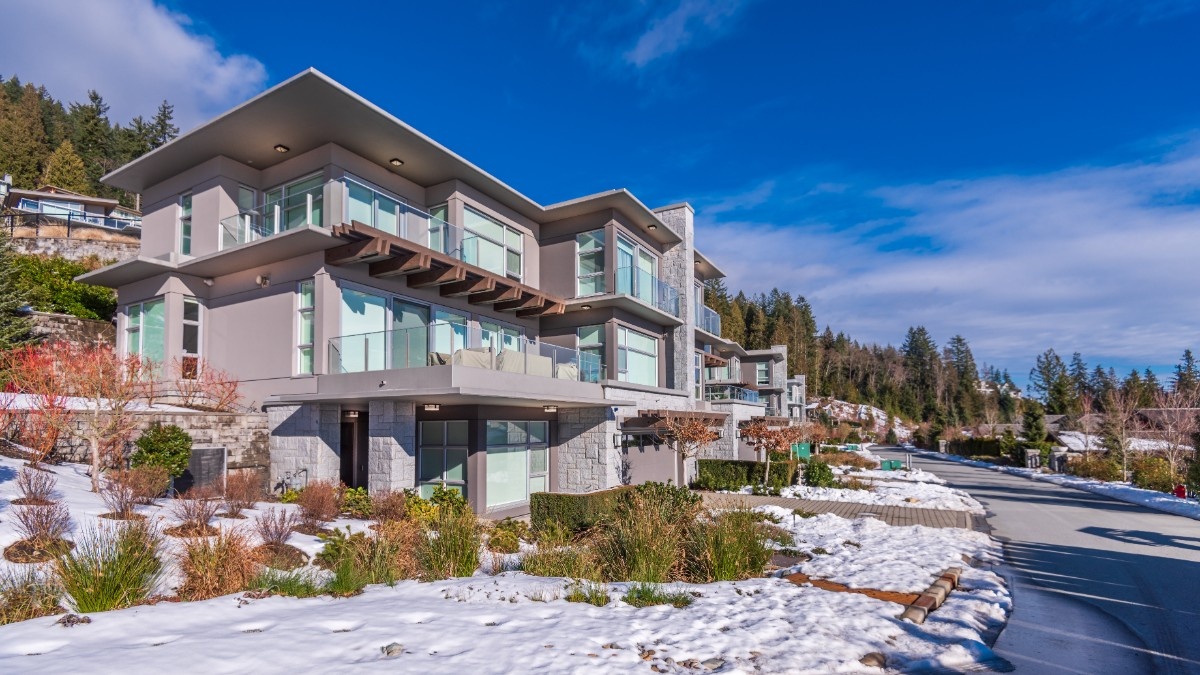A luxury mountain home in Salt Lake City almost covered in snow due to a bad winter