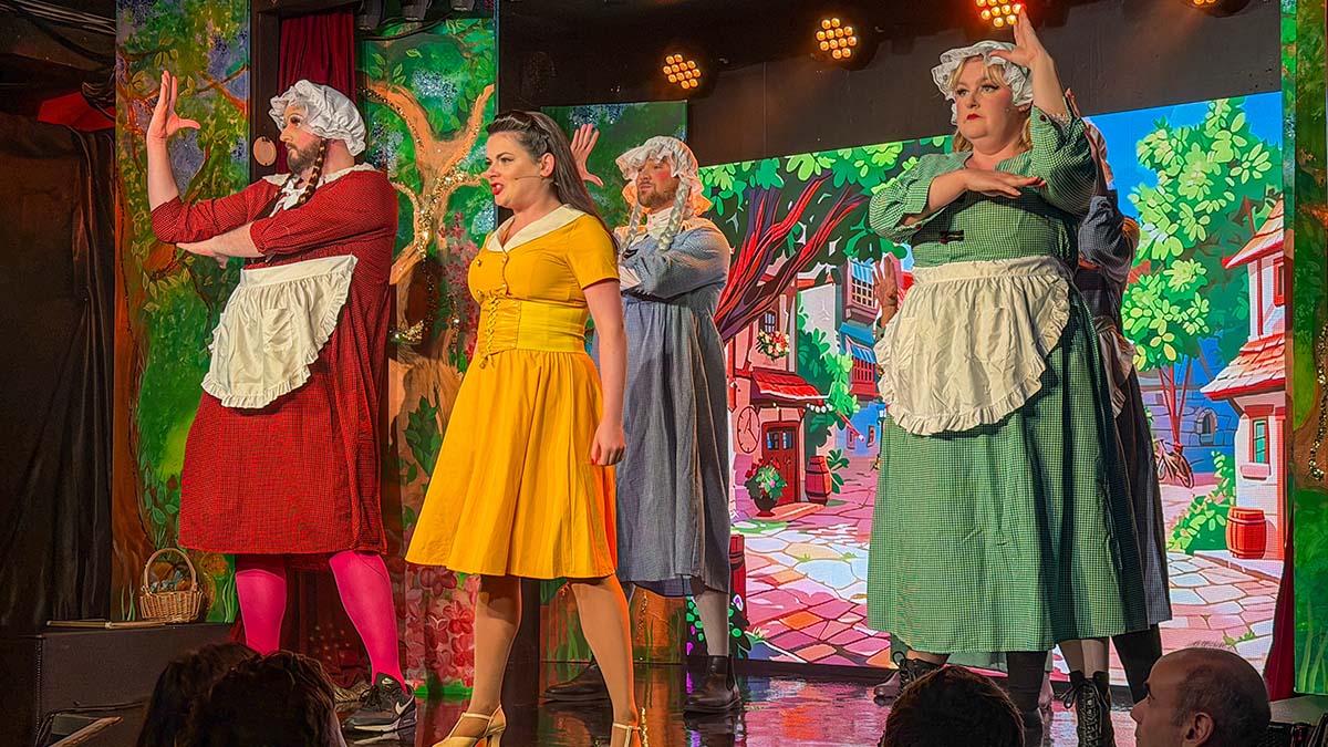 Lucy Penrose as Belle and cast of Growled, the festive panto at the Royal Vauxhall Tavern in London. Photo by Lex Melony