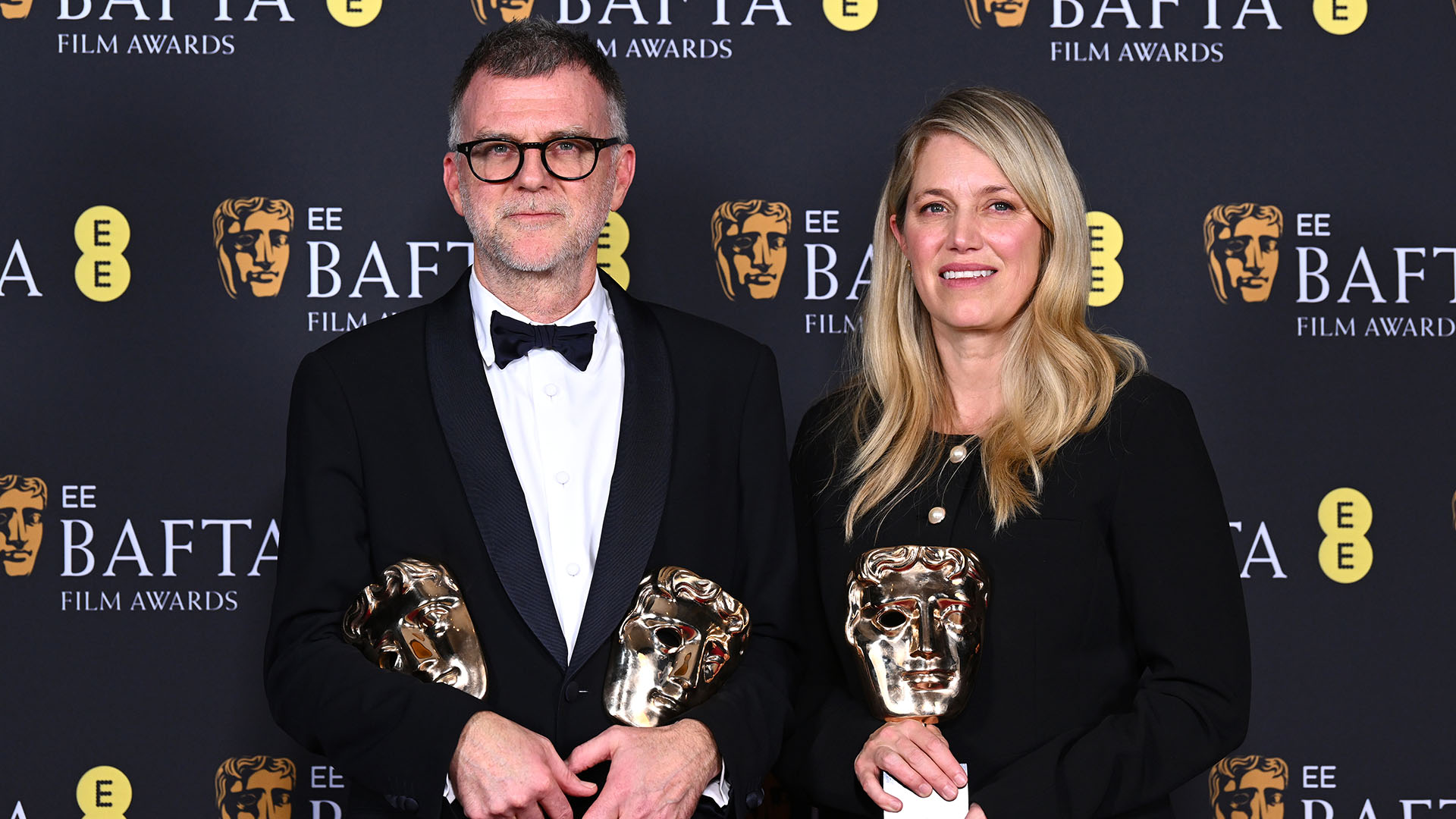 LONDON, ENGLAND - FEBRUARY 22: Paul Thomas Anderson and Sara Murphy with the Director Award, Adapted Screenplay Award and Cinematography Award for One Battle After Another during the EE BAFTA Film Awards 2026 at The Royal Festival Hall on February 22, 2026