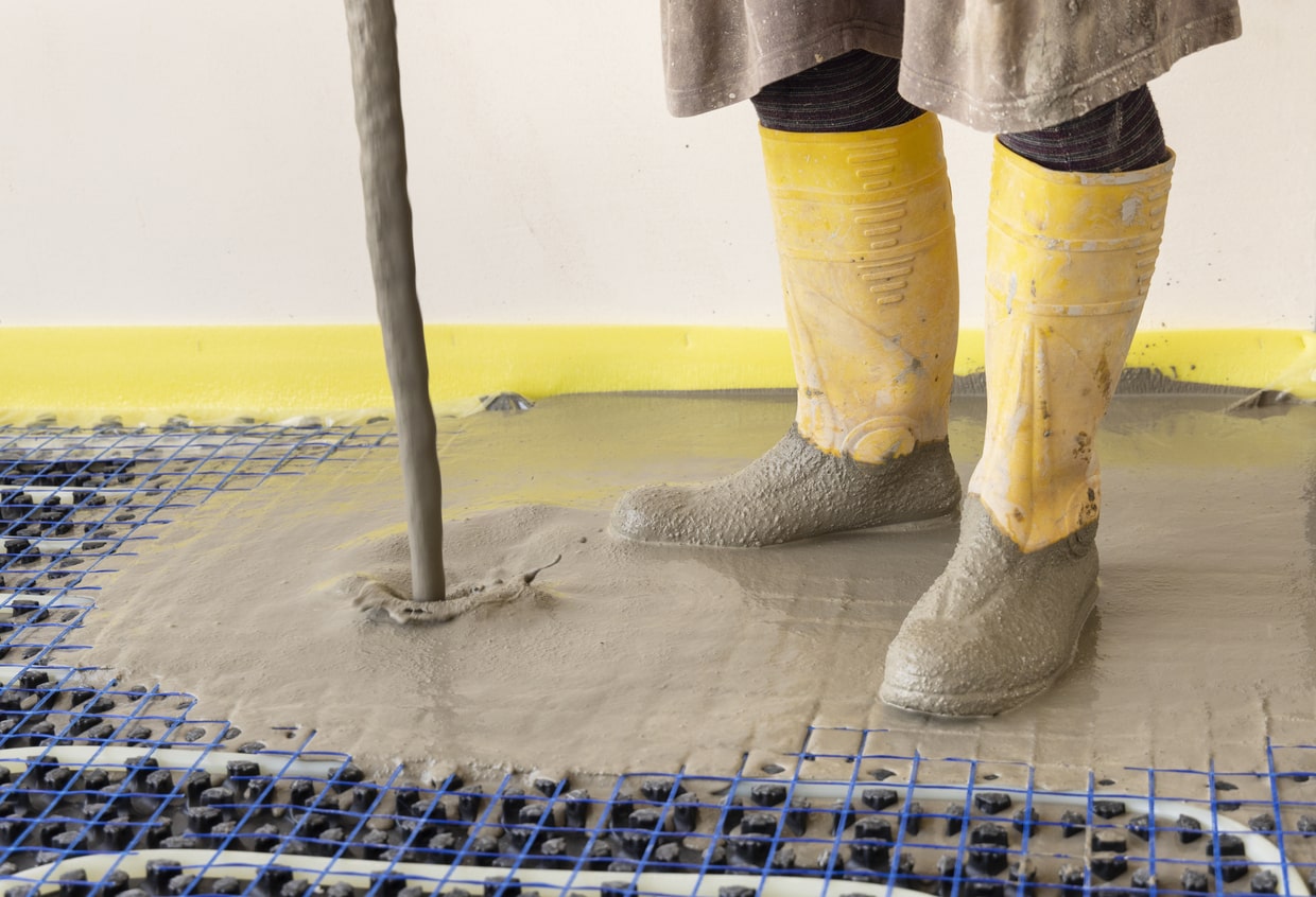 Coulage d'une dalle sur un plancher chauffant hydraulique