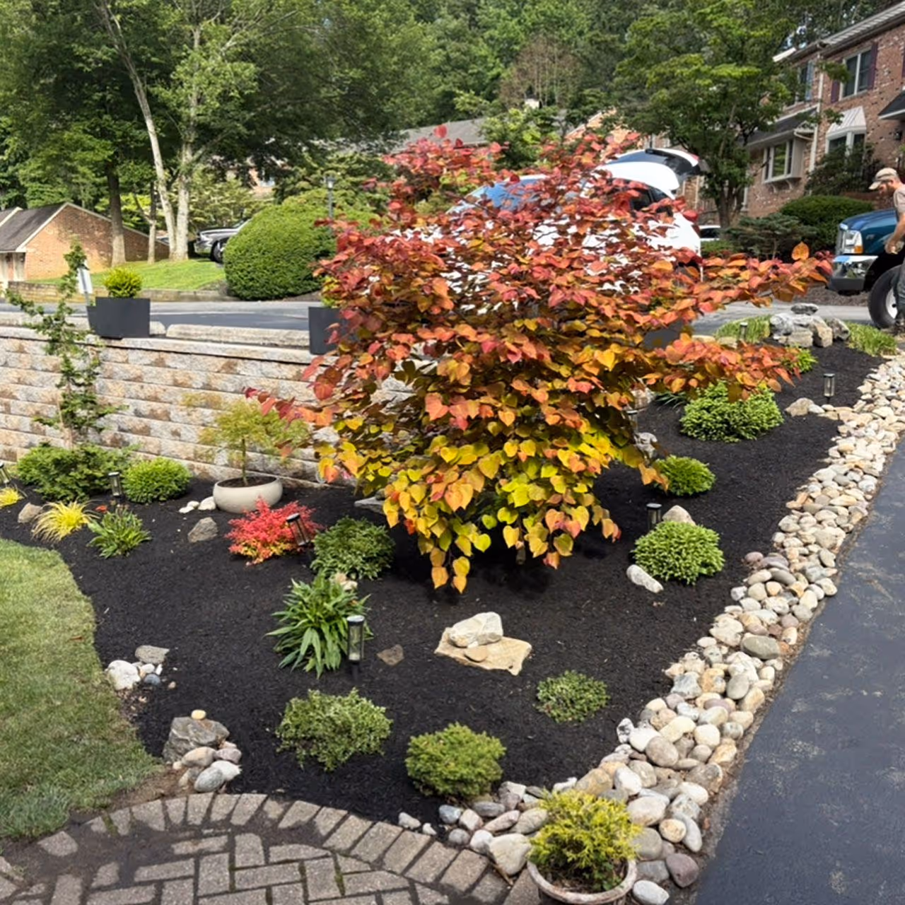 Professional landscaping project with mulch beds and plants by Brendan’s Lawn & Landscaping