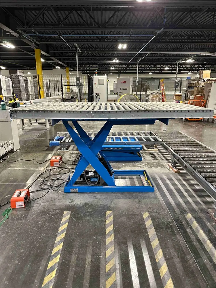 Optimus Lift 3K scissor lift with roller conveyor top – residential cabinet facility auction, Hickory NC