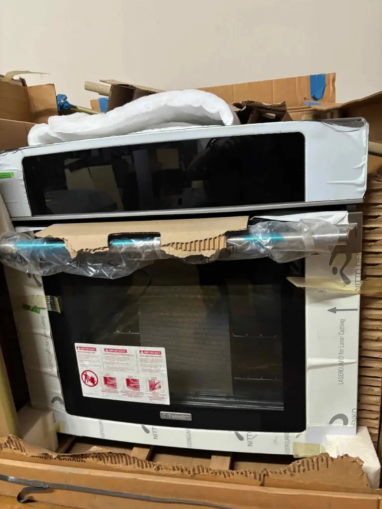 New-in-box stainless wall oven – Stone City Auction