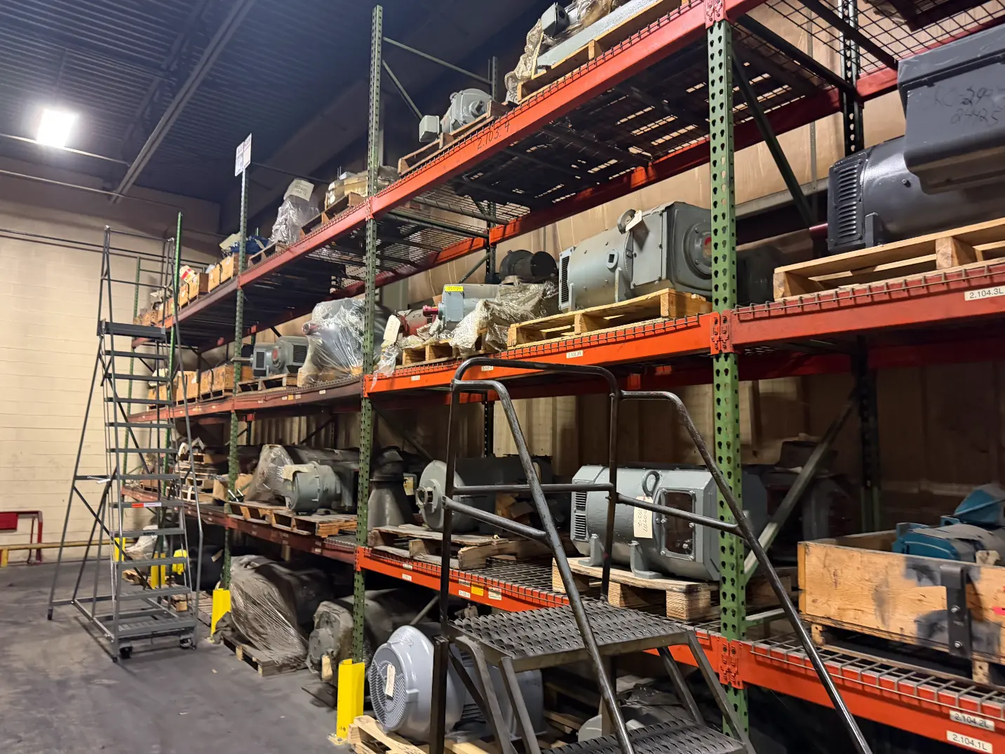 Pallet racking aisle with electric motors and parts – Salem VA tire plant