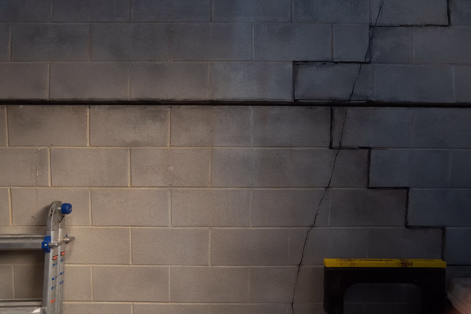 Cracked Block Wall in Wet Commercial Basement