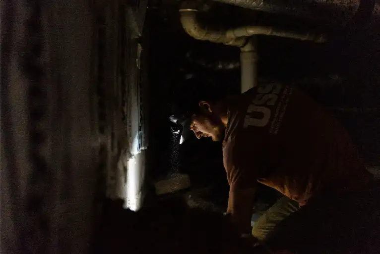 USS Crew Performing Foundation Repair Field Work