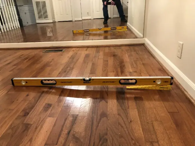 Sinking Unlevel Hardwood Floor from Foundation Settlement