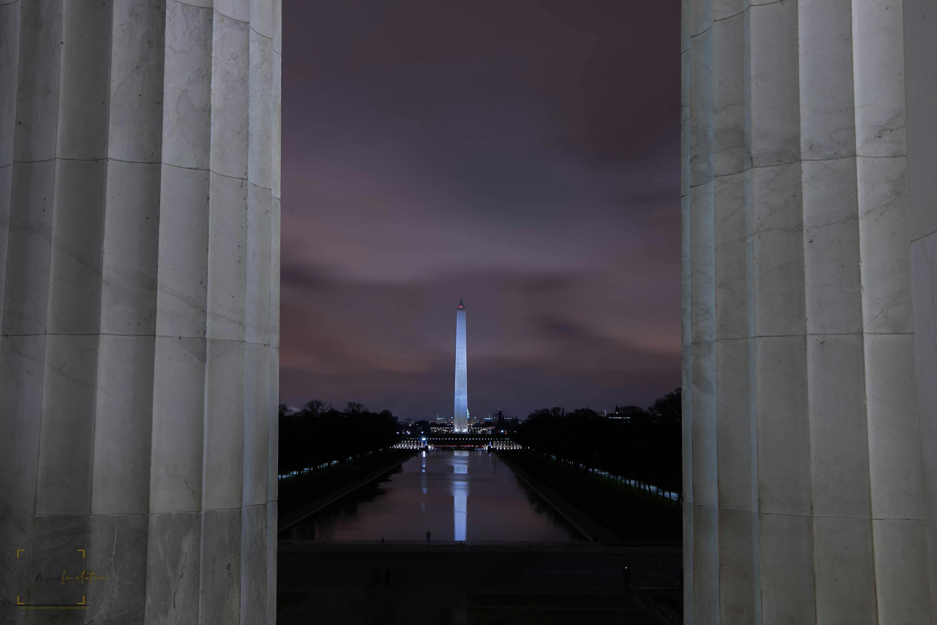 Photo of Washington Monument, taken from Lincoln Memorial, at night