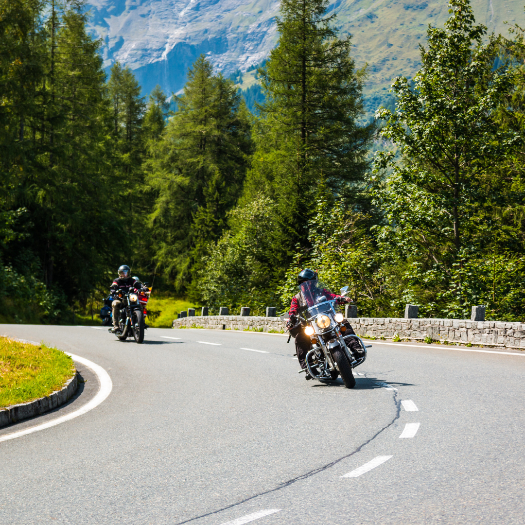 Motorcycle riders on a mountain highway