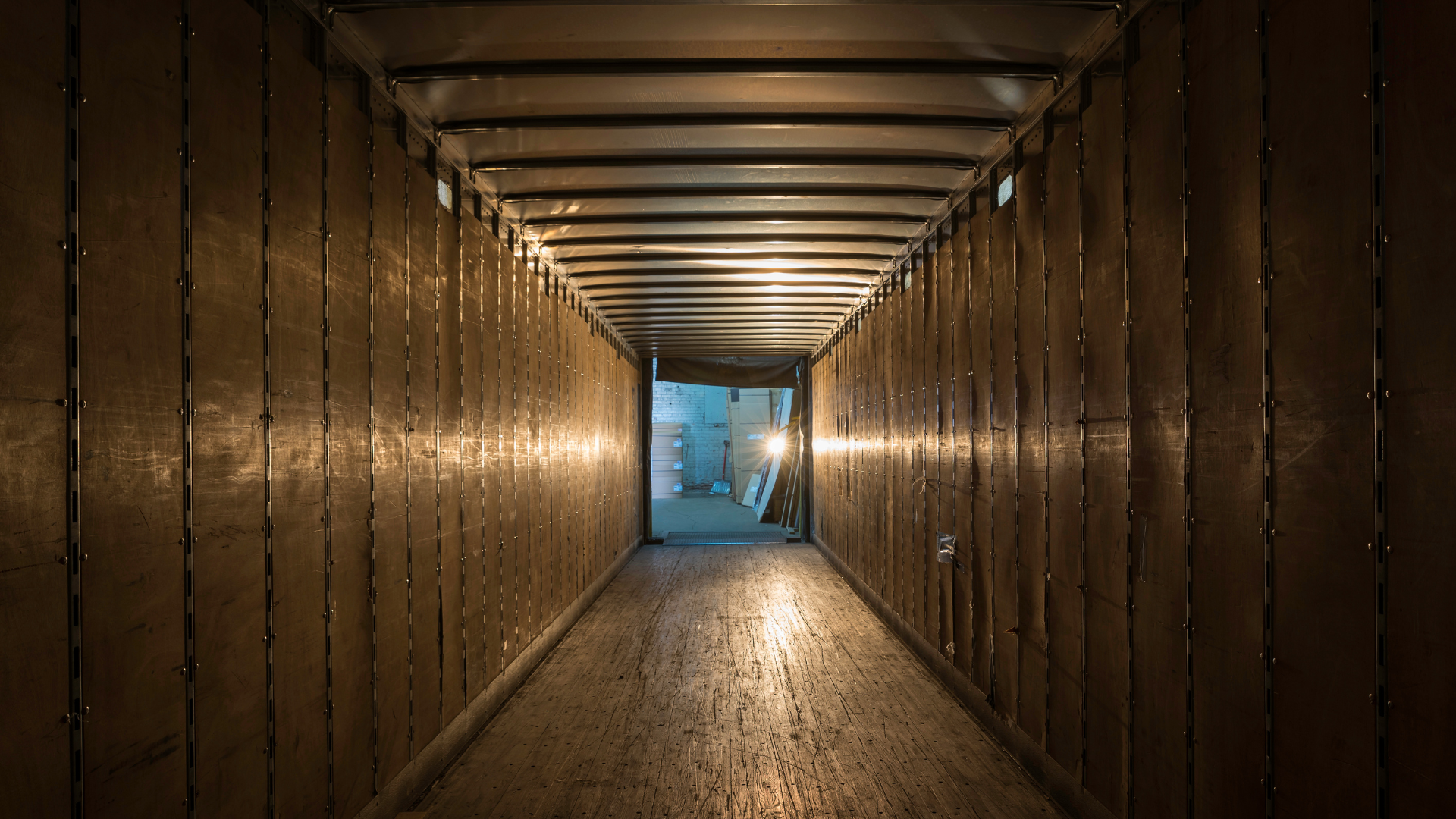 The inside view of an empty transport trailer