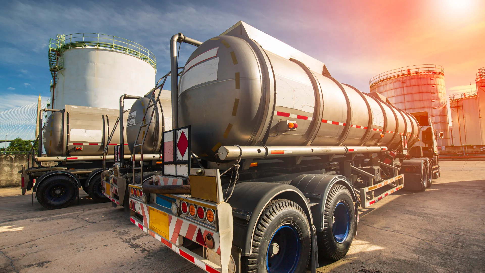 2 oil trucks at an oil facility