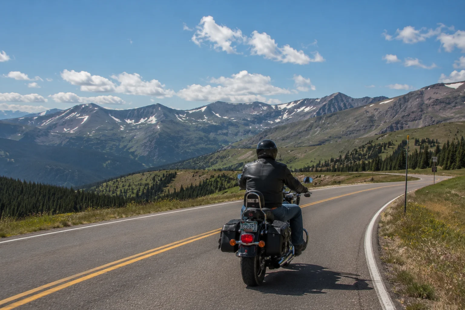 Motorcycle on Colorado's Peak to Peak Highway with Continental Divide views