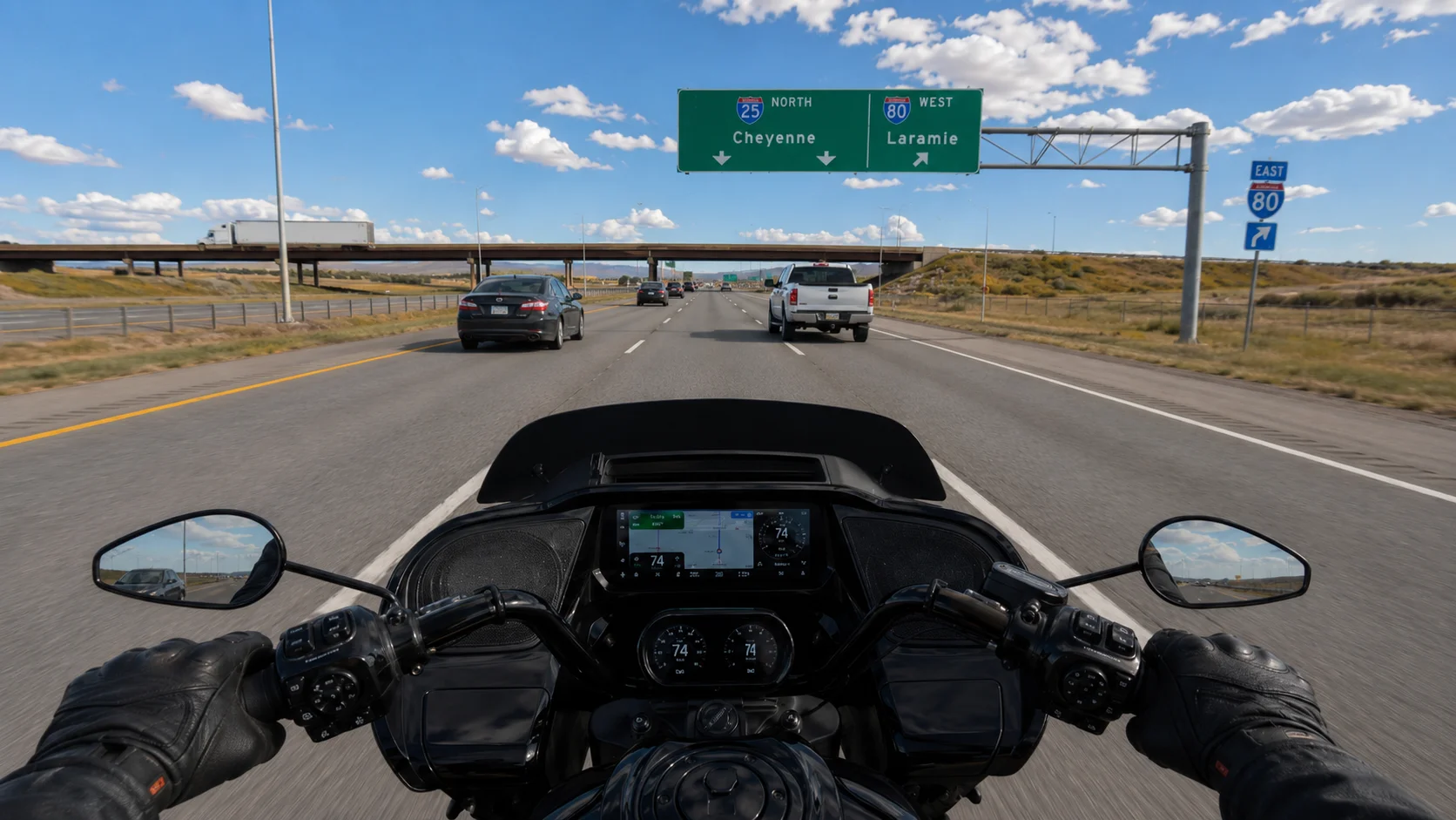 Motorcycle rider approaching the I-25 and I-80 interchange in Cheyenne, Wyoming