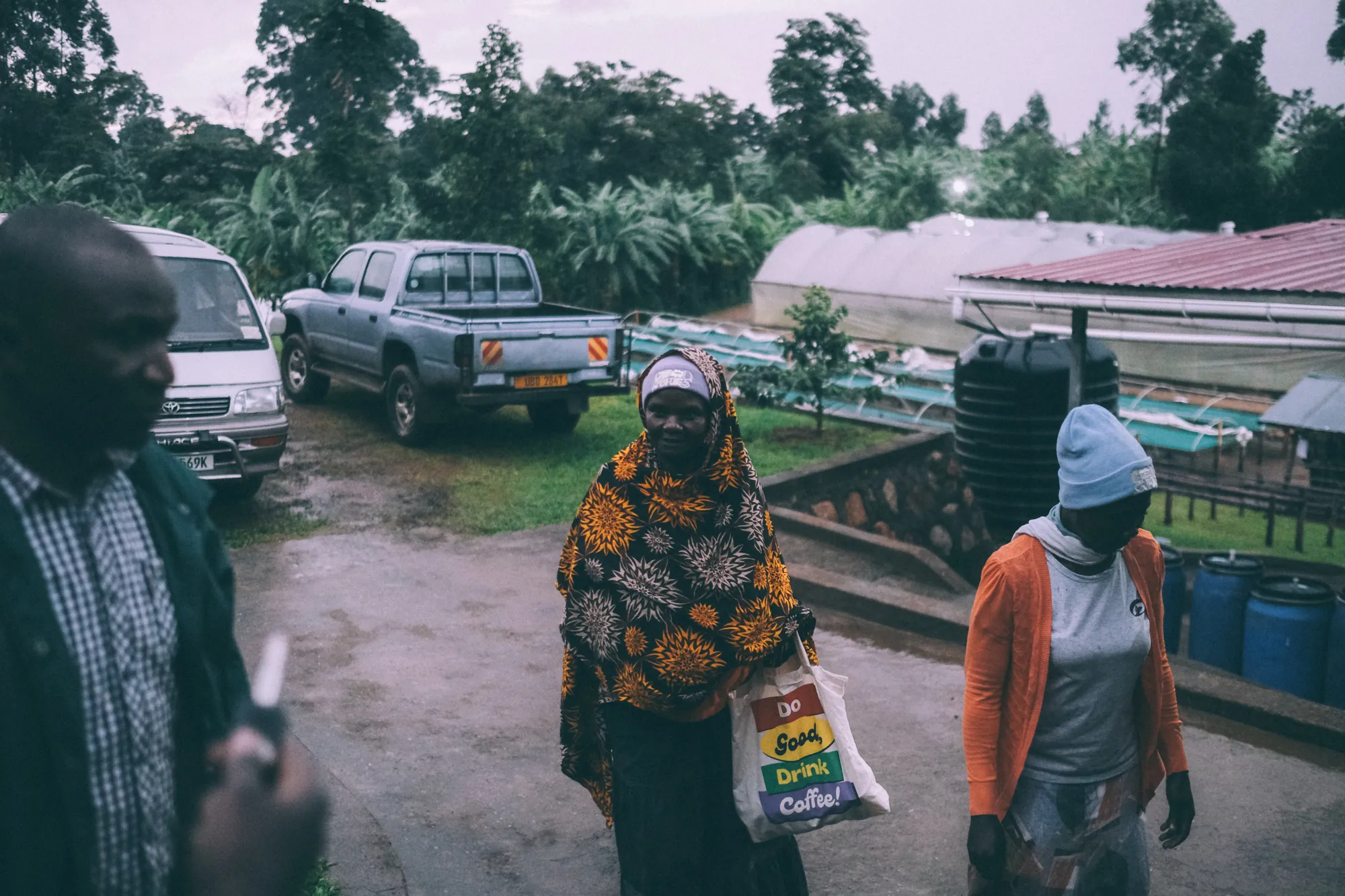 Coffee farmers on a rainy morning on Mt Elgon