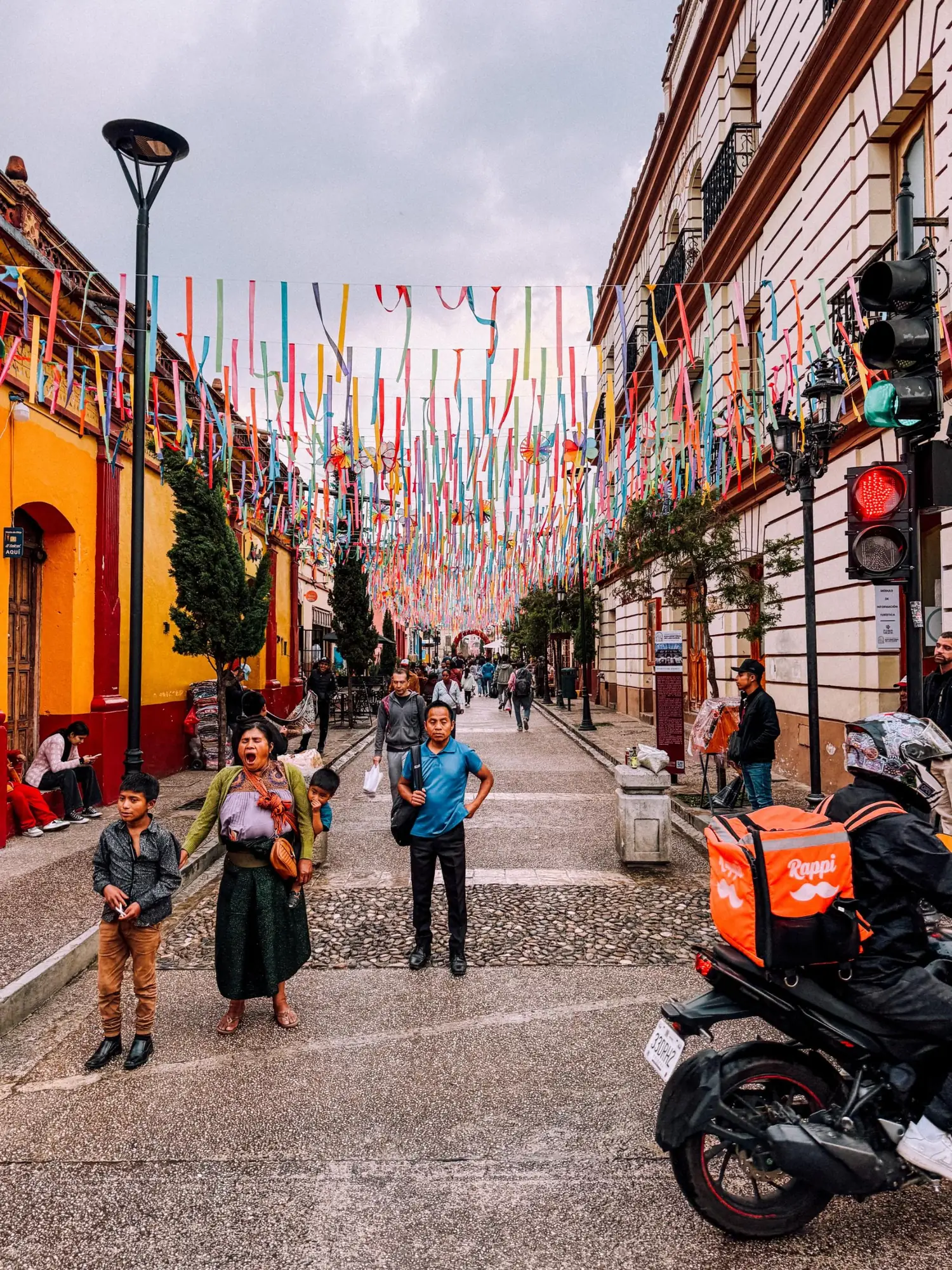 Colourful ribbons strung above a street in San Cristóbal