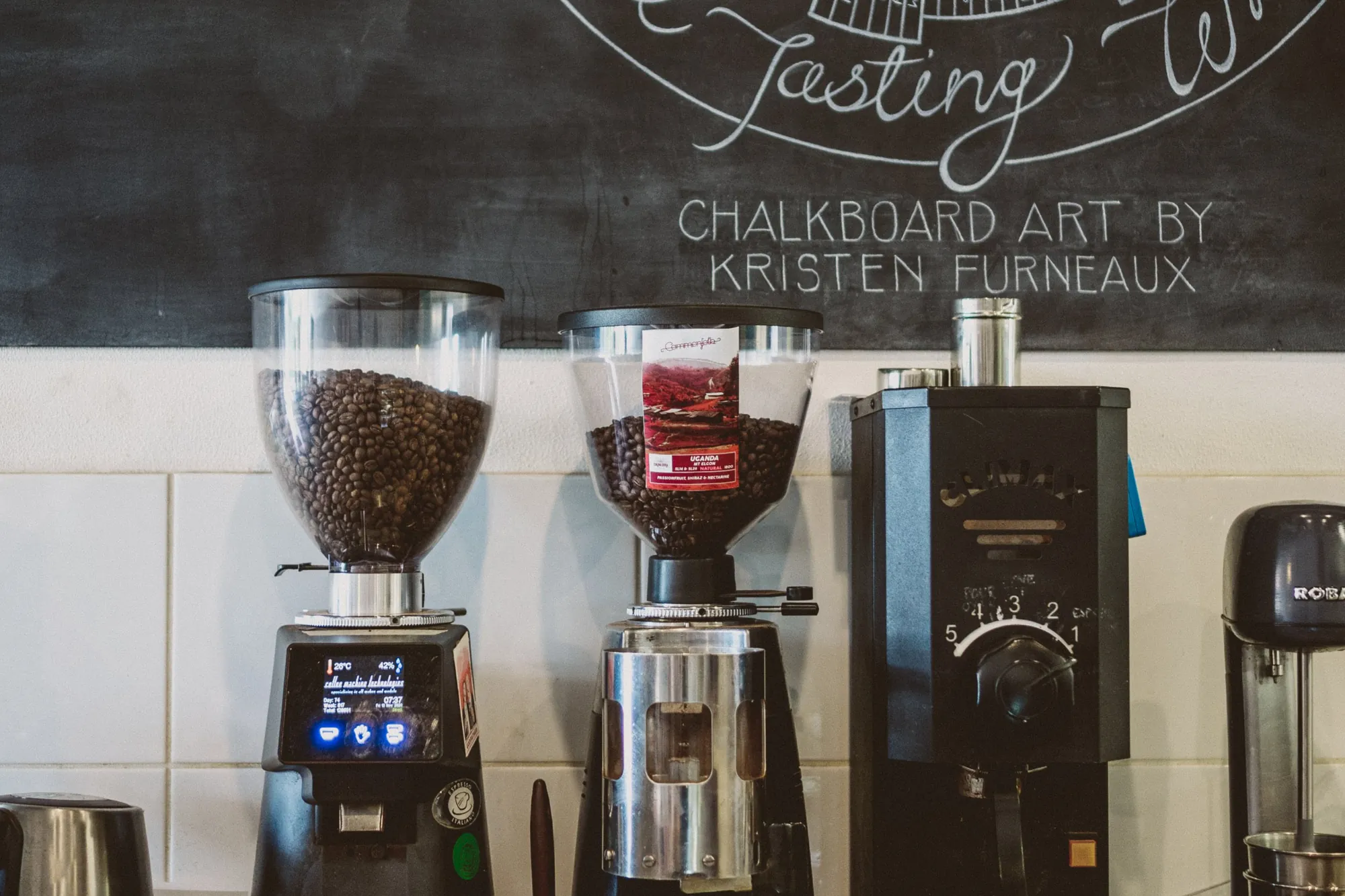 Coffee grinders on the counter at HomeGround Café