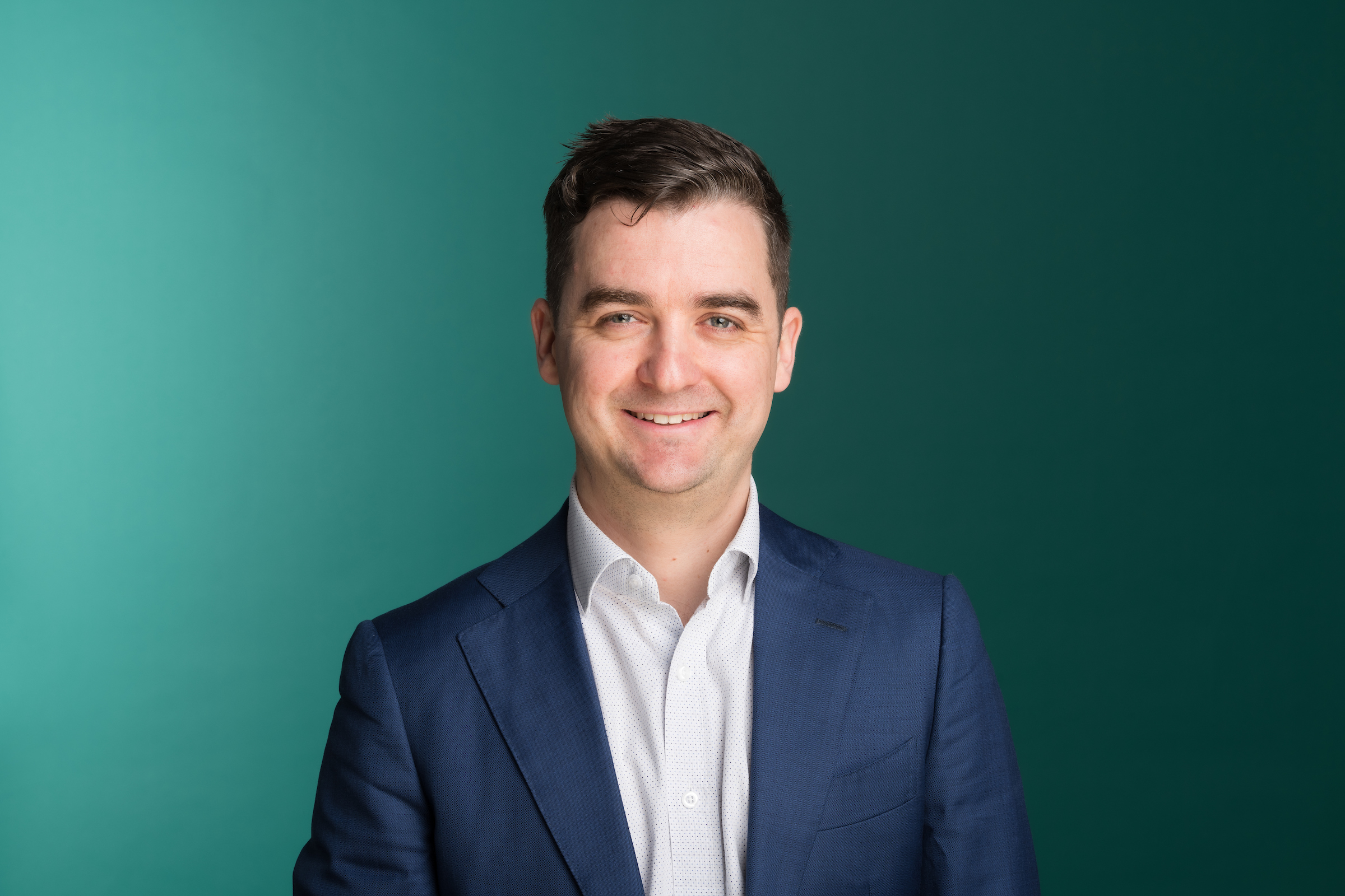 A head and shoulders photo of the author of the article, Daniel Wright, a Senior Consultant at MartinJenkins.