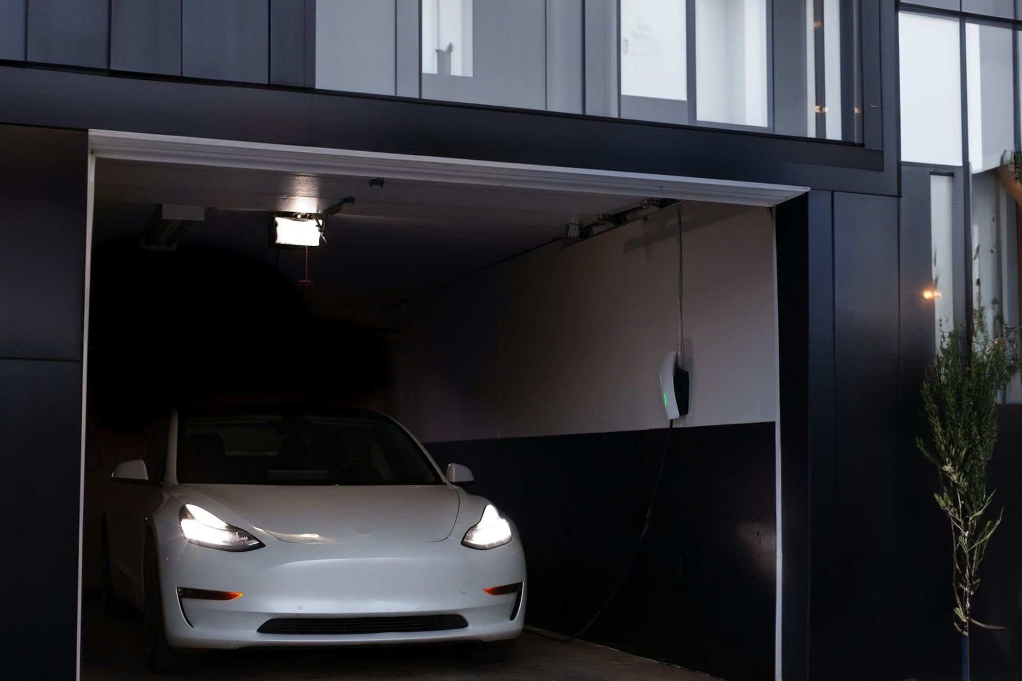 Electric car charging in a home garage