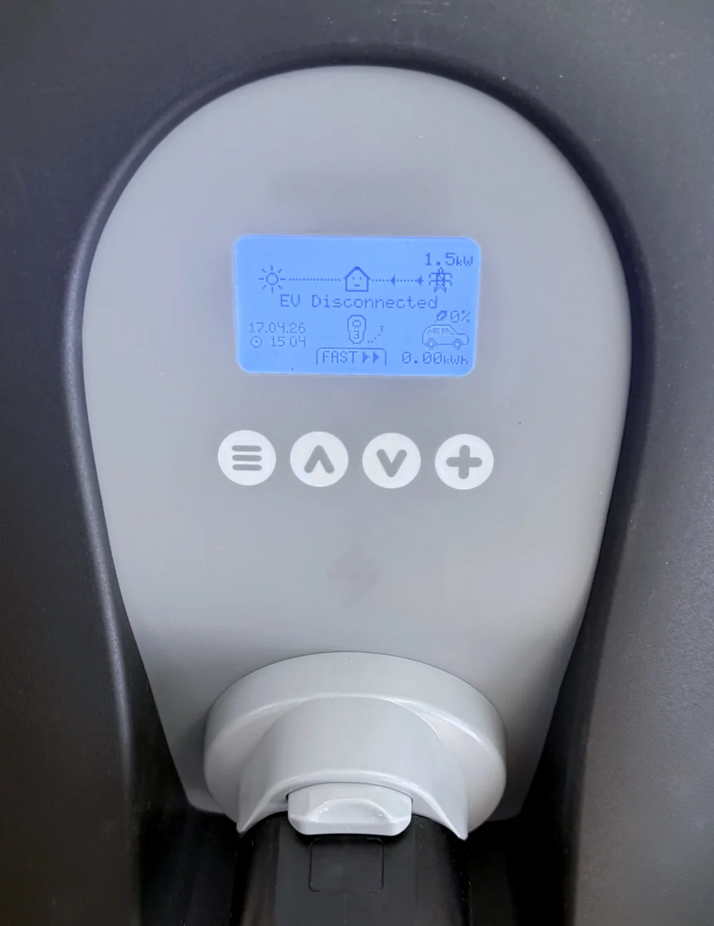 Close-up of a smart home EV charger display and controls