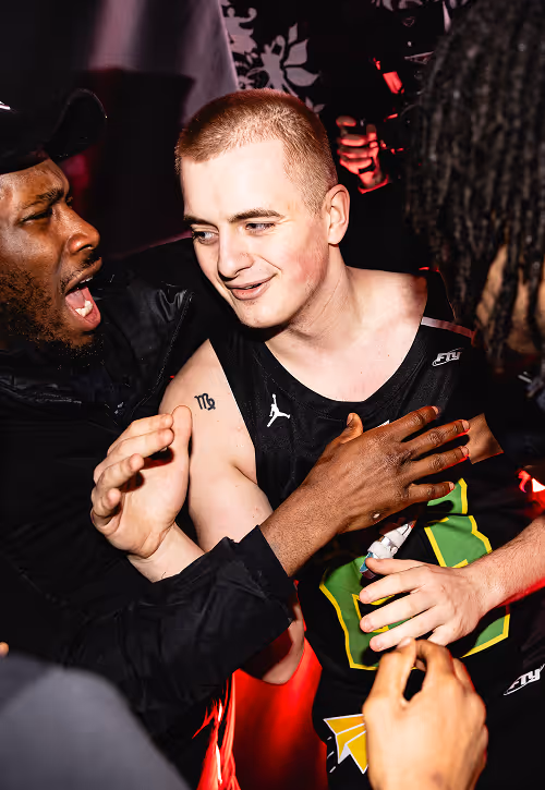 Young people celebrating victory in basketball game