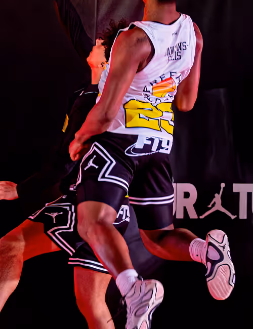 Basketball players mid air
