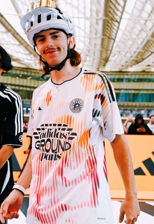 bmx bike rider wearing adidas ground paris tshirts
