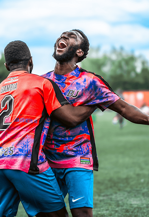 Football players celebrating and smiliing