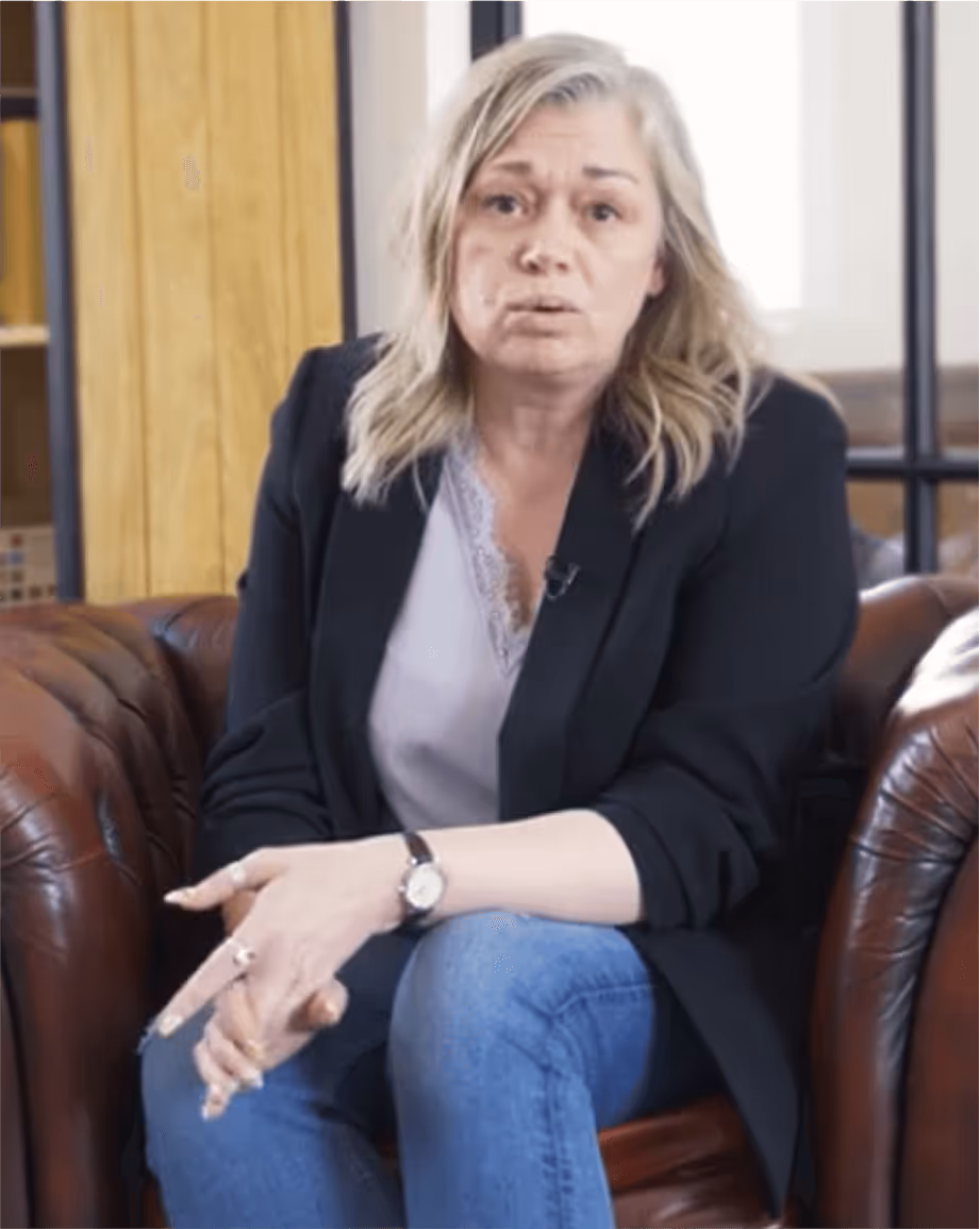 a woman sitting in a chair